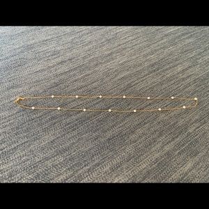Gold and pearl costume necklace